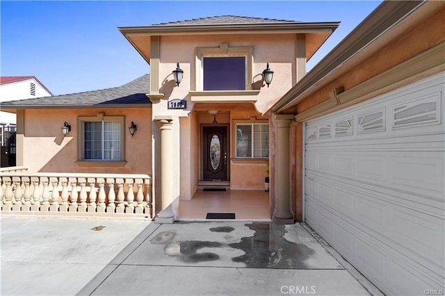 7060 Morse Ave, North Hollywood, CA 91605 - property entrance with stucco siding and a garage