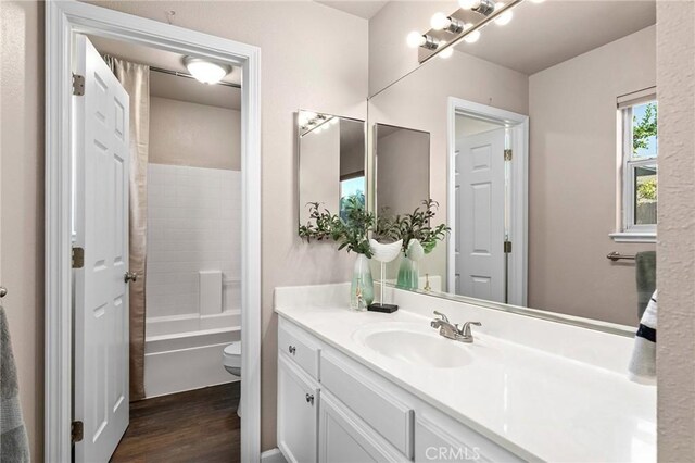 2078 Mansfield Ct, Chico, CA 95928 - full bath featuring vanity, wood finished floors, and bathing tub / shower combination