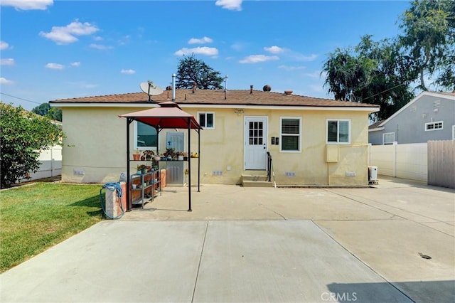 108 Chula St, Monrovia, CA 91016 - rear view of house with a patio area, stucco siding, and entry steps