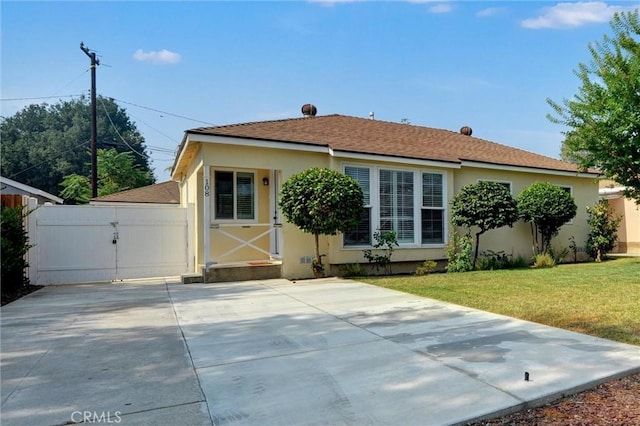 108 Chula St, Monrovia, CA 91016 - back of house with stucco siding, a gate, and roof with shingles