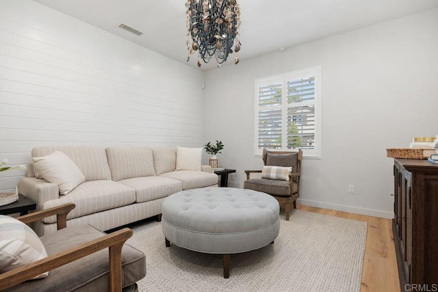 6925 Waters End Dr, Carlsbad, CA 92011 - living room featuring light wood-style flooring and baseboards