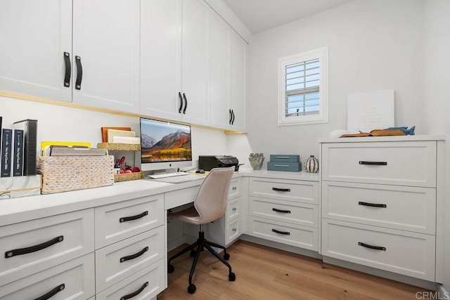 6925 Waters End Dr, Carlsbad, CA 92011 - office with built in study area and light wood-type flooring