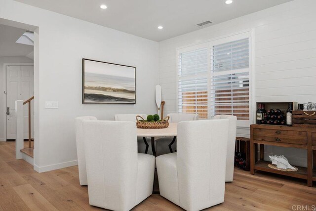 6925 Waters End Dr, Carlsbad, CA 92011 - dining space featuring light wood-type flooring, recessed lighting, and stairs