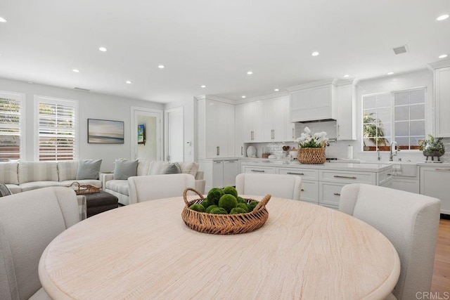 6925 Waters End Dr, Carlsbad, CA 92011 - dining room featuring recessed lighting and wood finished floors