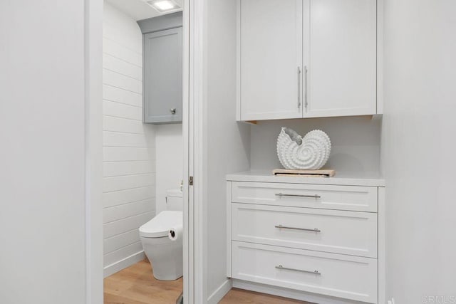 6925 Waters End Dr, Carlsbad, CA 92011 - bathroom with toilet and wood finished floors