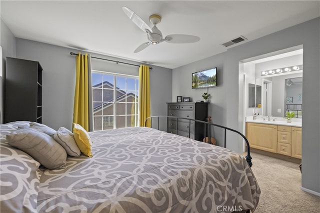 27151 Manor Cir Unit 54, Valencia, CA 91354 - bedroom with light colored carpet, ensuite bathroom, and a ceiling fan