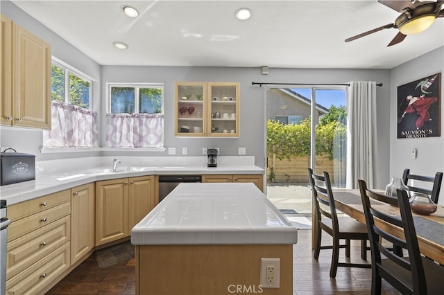 27151 Manor Cir Unit 54, Valencia, CA 91354 - kitchen featuring tile counters, glass insert cabinets, dark wood finished floors, dishwasher, and recessed lighting
