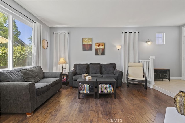 27151 Manor Cir Unit 54, Valencia, CA 91354 - living area with dark wood-style flooring and baseboards