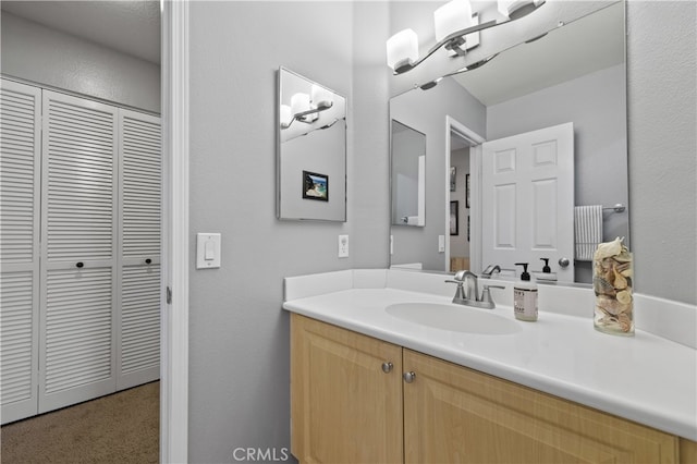 27151 Manor Cir Unit 54, Valencia, CA 91354 - bathroom featuring vanity and a closet