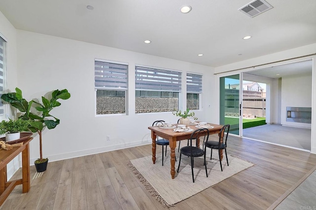 2415 Calle Grandon, Chula Vista, CA 91913 - dining area with light wood-type flooring and recessed lighting