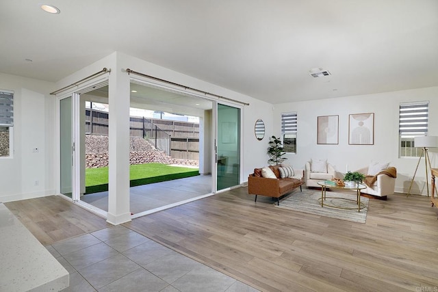 2415 Calle Grandon, Chula Vista, CA 91913 - living room featuring light wood-style flooring and baseboards