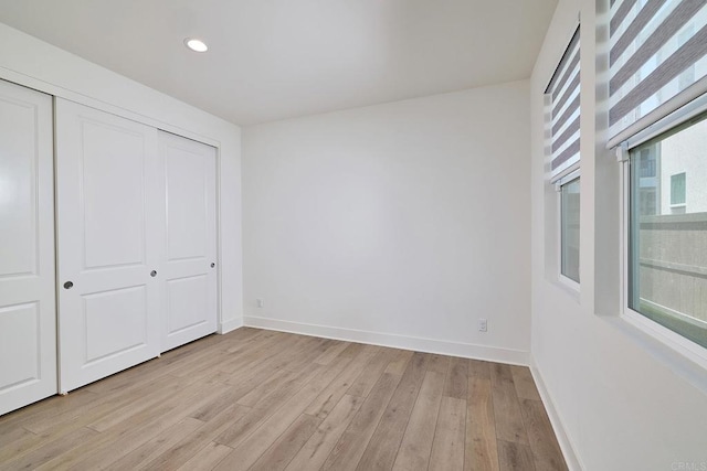 2415 Calle Grandon, Chula Vista, CA 91913 - unfurnished bedroom with light wood-type flooring, a closet, and recessed lighting