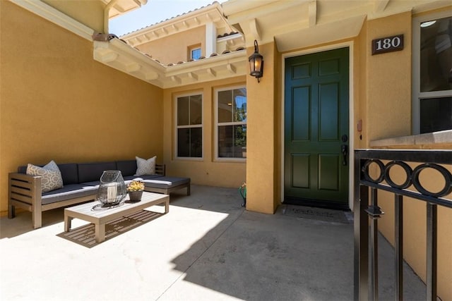 180 Guinevere, Irvine, CA 92620 - entrance to property with an outdoor living space, stucco siding, and a patio area