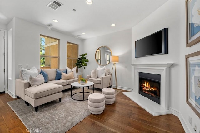 180 Guinevere, Irvine, CA 92620 - living room with a glass covered fireplace, wood finished floors, and recessed lighting