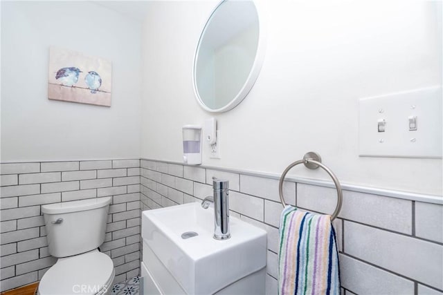 14750 Danbrook Dr, Whittier, CA 90604 - half bathroom featuring tile walls, wainscoting, and vanity