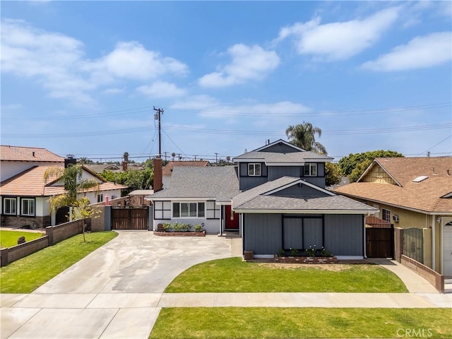 14750 Danbrook Dr, Whittier, CA 90604 - view of front of home with a gate, driveway, a chimney, and a shingled roof