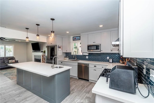 14750 Danbrook Dr, Whittier, CA 90604 - kitchen with open floor plan, backsplash, light countertops, stainless steel appliances, and recessed lighting