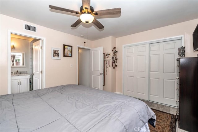 14750 Danbrook Dr, Whittier, CA 90604 - bedroom with a closet, wood finished floors, a ceiling fan, and connected bathroom