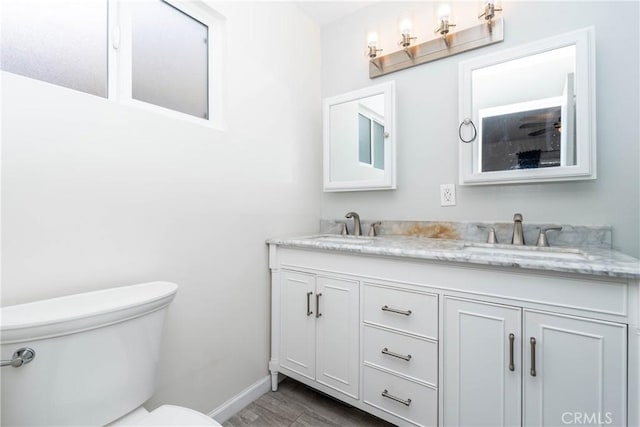 14750 Danbrook Dr, Whittier, CA 90604 - bathroom featuring double vanity and wood finished floors