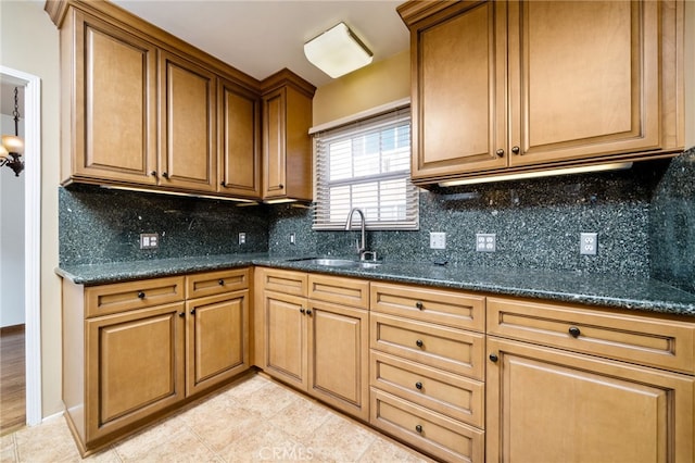 782 Lewis St, Pomona, CA 91767 - kitchen with decorative backsplash, light tile patterned floors, and brown cabinets