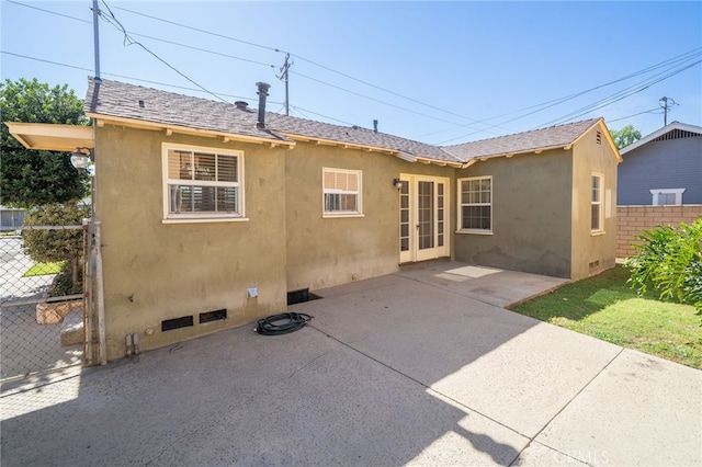 782 Lewis St, Pomona, CA 91767 - rear view of house with stucco siding, a patio area, french doors, and crawl space