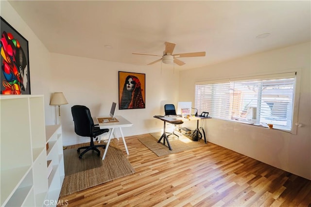 658 W 120th St, Los Angeles, CA 90044 - office area with a ceiling fan and wood finished floors