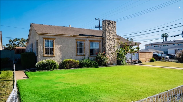 658 W 120th St, Los Angeles, CA 90044 - view of front facade featuring stucco siding