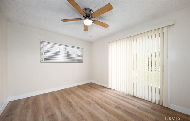 25070 Tulip Ave, Loma Linda, CA 92354 - empty room featuring wood finished floors, a textured ceiling, and a ceiling fan