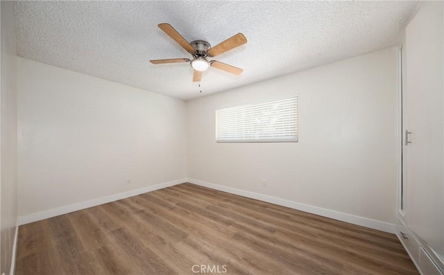 25070 Tulip Ave, Loma Linda, CA 92354 - spare room featuring wood finished floors, a textured ceiling, and a ceiling fan