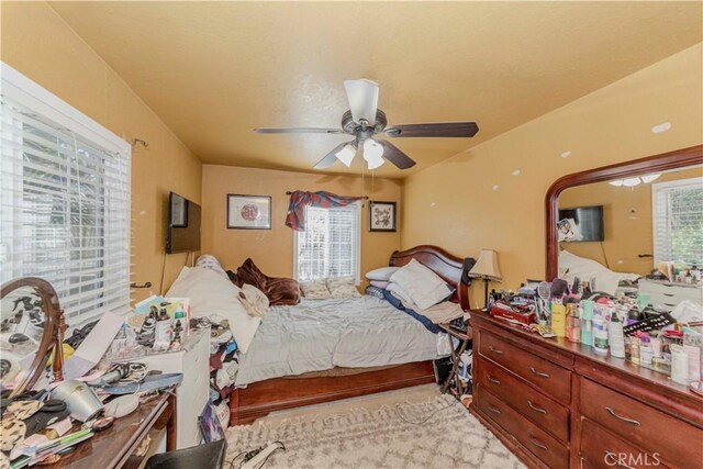 1493 W Grand Ave, Pomona, CA 91766 - carpeted bedroom featuring ceiling fan