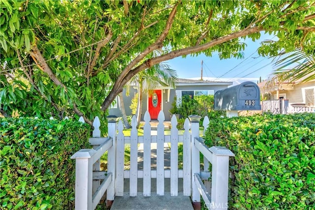 1493 W Grand Ave, Pomona, CA 91766 - exterior space with a fenced front yard and a gate