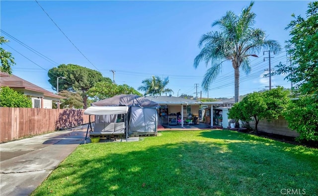 1493 W Grand Ave, Pomona, CA 91766 - rear view of property featuring driveway