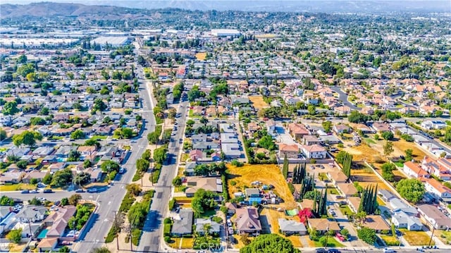 1493 W Grand Ave, Pomona, CA 91766 - drone / aerial view of a mountainous background
