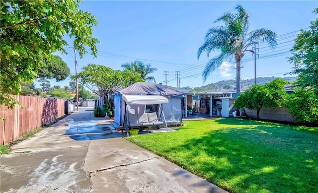 1493 W Grand Ave, Pomona, CA 91766 - back of house featuring concrete driveway