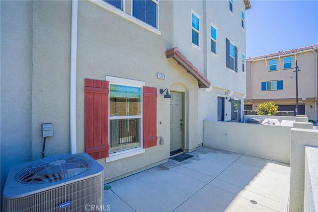 1239 Bonnet Way, Torrance, CA 90502 - view of exterior entry featuring stucco siding and a patio area