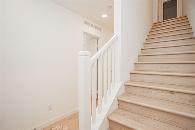 1239 Bonnet Way, Torrance, CA 90502 - stairs featuring wood finished floors and recessed lighting