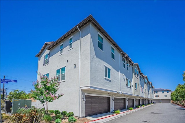 1239 Bonnet Way, Torrance, CA 90502 - view of building exterior with an attached garage