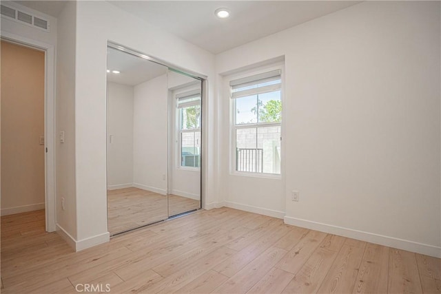 1239 Bonnet Way, Torrance, CA 90502 - unfurnished bedroom featuring light wood-style flooring, a closet, and recessed lighting