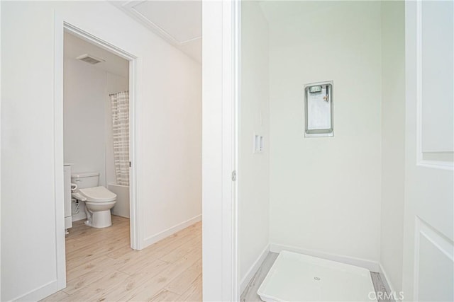 1239 Bonnet Way, Torrance, CA 90502 - bathroom with a shower with curtain and wood finished floors