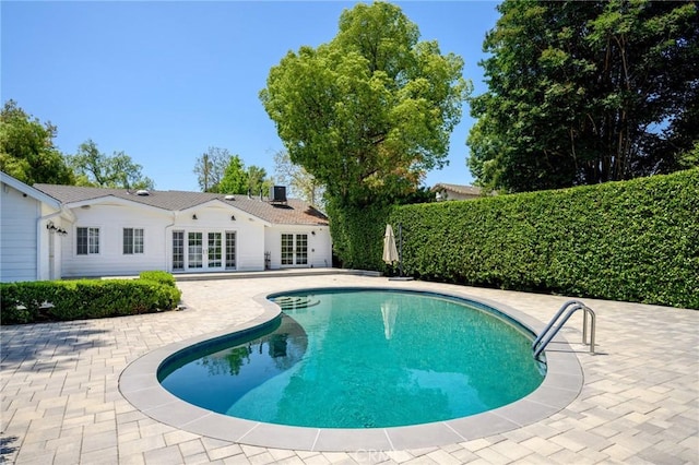 17437 Chase St, Northridge, CA 91325 - view of swimming pool featuring french doors and a patio area