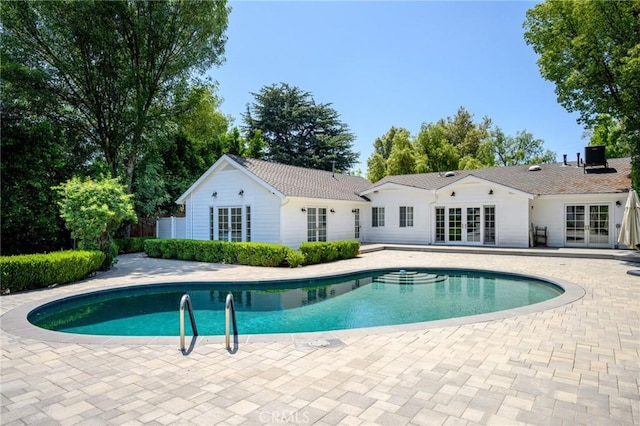 17437 Chase St, Northridge, CA 91325 - outdoor pool with french doors and a patio area