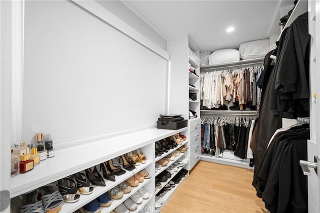 17437 Chase St, Northridge, CA 91325 - walk in closet featuring wood finished floors