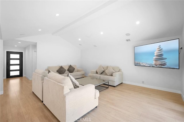 17437 Chase St, Northridge, CA 91325 - living room featuring light wood finished floors, vaulted ceiling, and recessed lighting