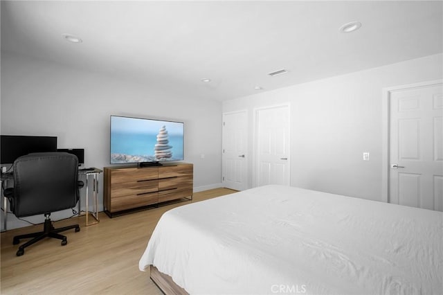 17437 Chase St, Northridge, CA 91325 - bedroom with light wood finished floors, recessed lighting, and a desk
