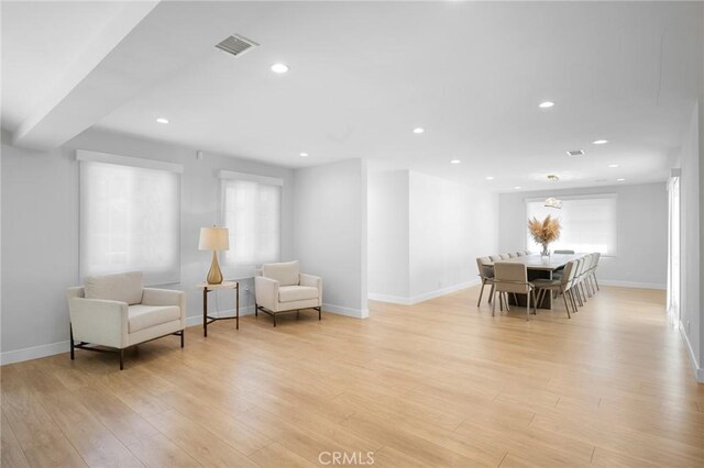17437 Chase St, Northridge, CA 91325 - living area with light wood-style flooring and recessed lighting