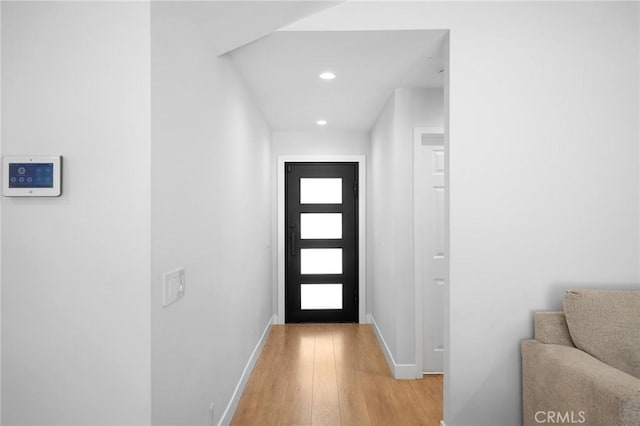 17437 Chase St, Northridge, CA 91325 - doorway with light wood-style floors and recessed lighting