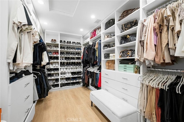 17437 Chase St, Northridge, CA 91325 - walk in closet featuring attic access and light wood-type flooring