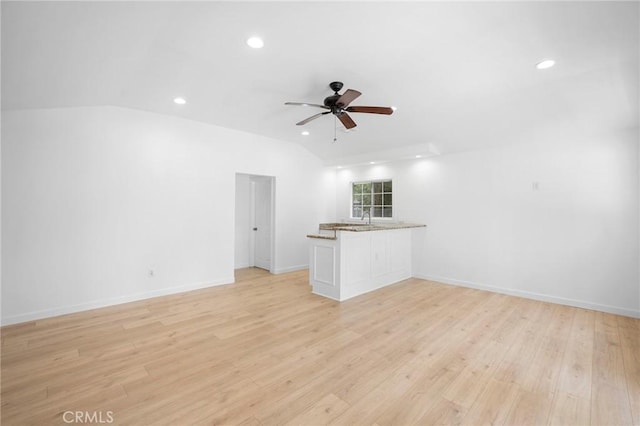17437 Chase St, Northridge, CA 91325 - unfurnished living room with vaulted ceiling, light wood-style floors, recessed lighting, and ceiling fan