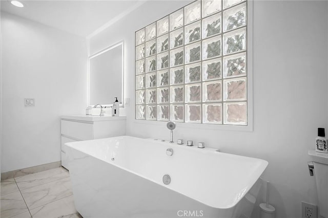 17437 Chase St, Northridge, CA 91325 - bathroom with a soaking tub, marble finish floors, and vanity
