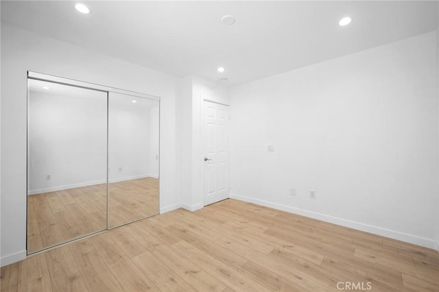 17437 Chase St, Northridge, CA 91325 - unfurnished bedroom featuring recessed lighting, light wood-type flooring, and a closet